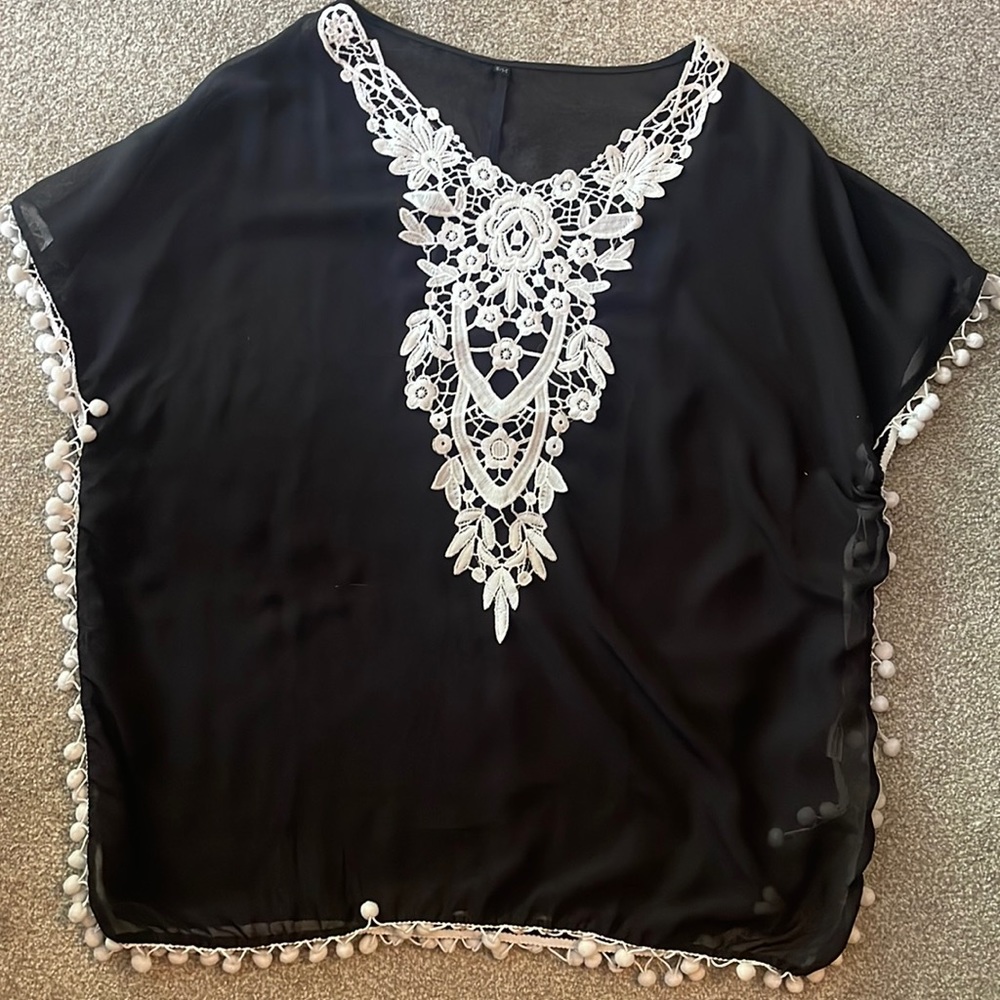 Woman’s swimsuit cover up size s/m